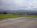 Tibet Kailash 12 Flying From Kathmandu 02 View Of Boudhanath From Runway As we reached the end of the runway, Boudhanath came into view.